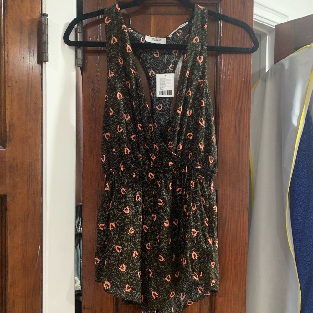 Out From Under Romper with pink flower detail